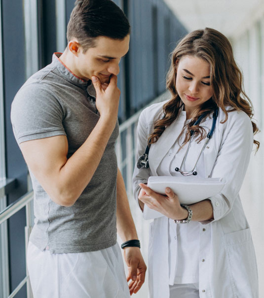 young-woman-doctor-practitioner-consulting-male-patient-Paid-Clinical-Trials-in-Tampa