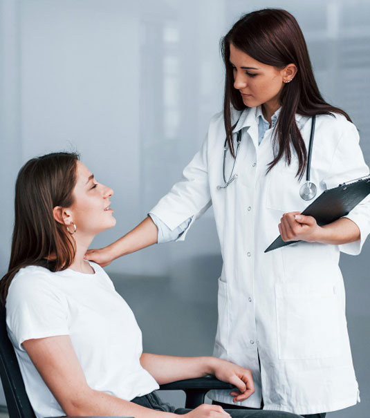 friendly-doctor-listening-patient-young-woman-have-visit-with-female-doctor-modern-clinic-Paid-Clinical-Trials-in-Tampa